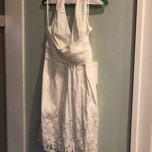 White dress with uncovered back